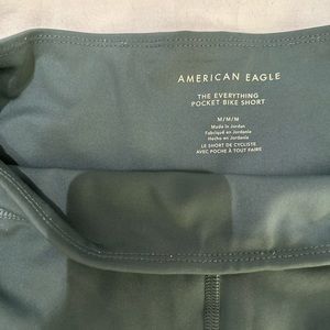 American Eagle biker shorts, green shorts, athletic wear, pockets